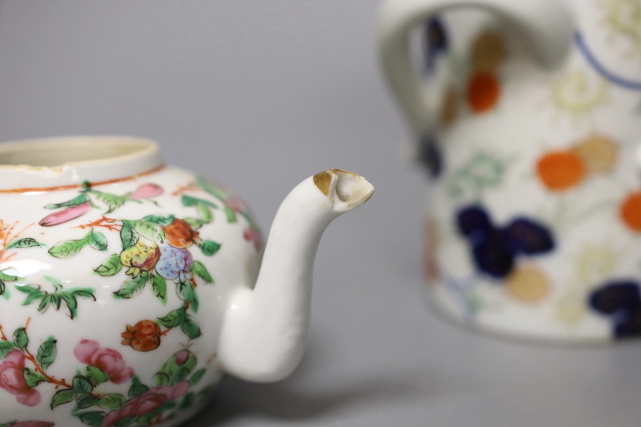 A Chinese Canton decorated famille rose teapot and a Japanese Fukugawa three handled vase (2), tallest 15cm